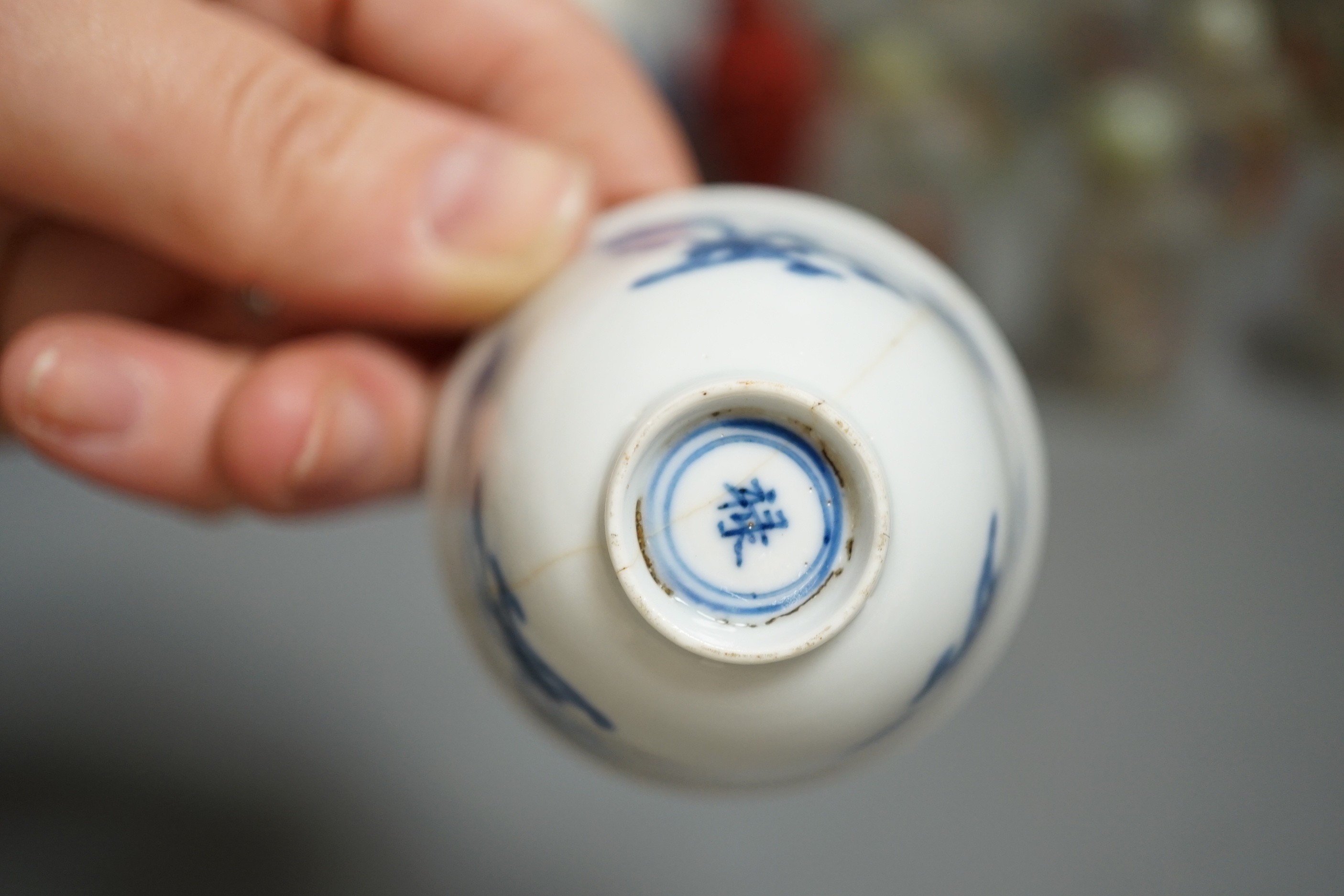 A collection of 20th century Chinese export reverse painted snuff bottles with associated blue and white porcelain examples, some 19th century